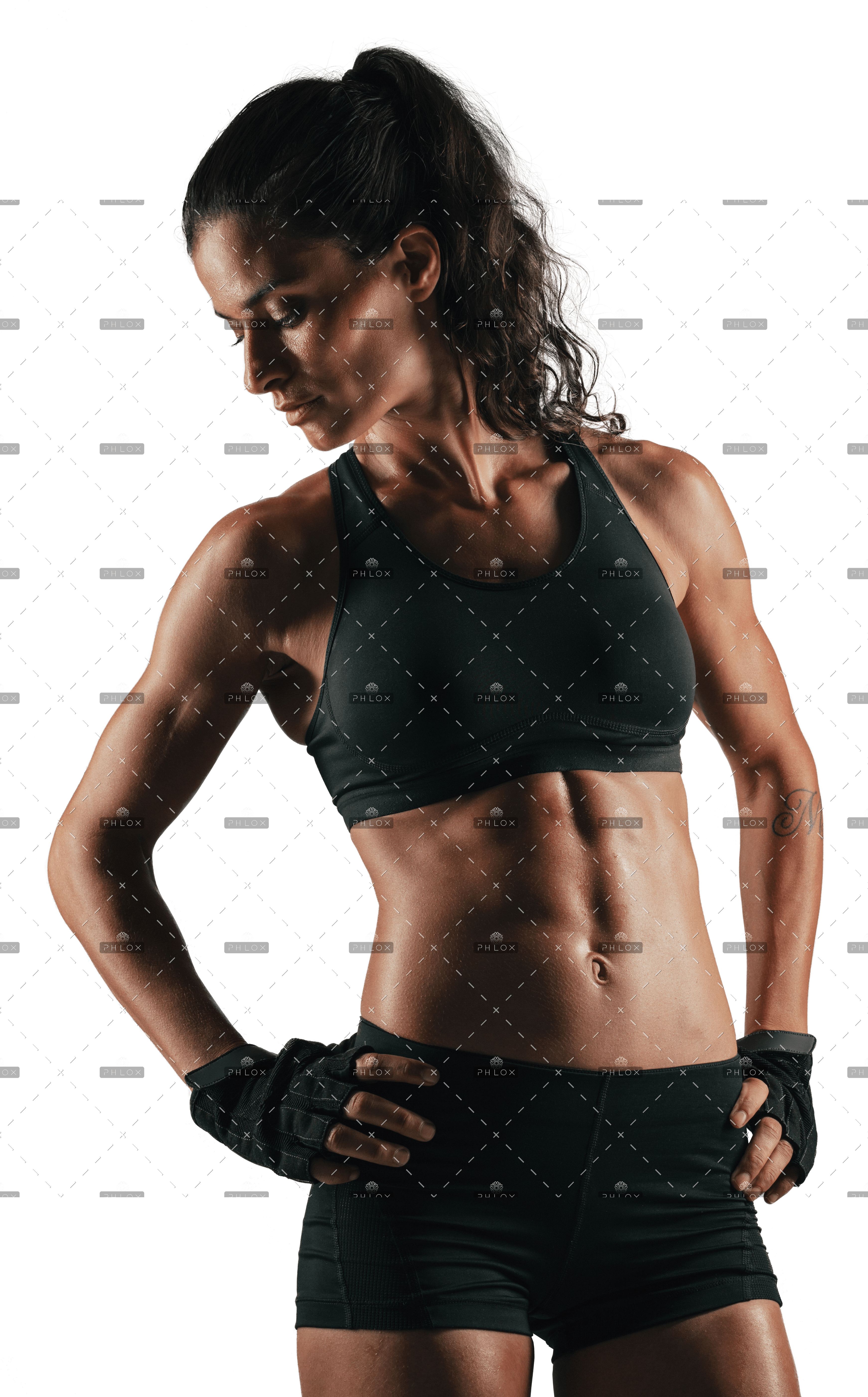 demo-attachment-170-woman-looking-back-while-flexing-abdominal-PAANKZB